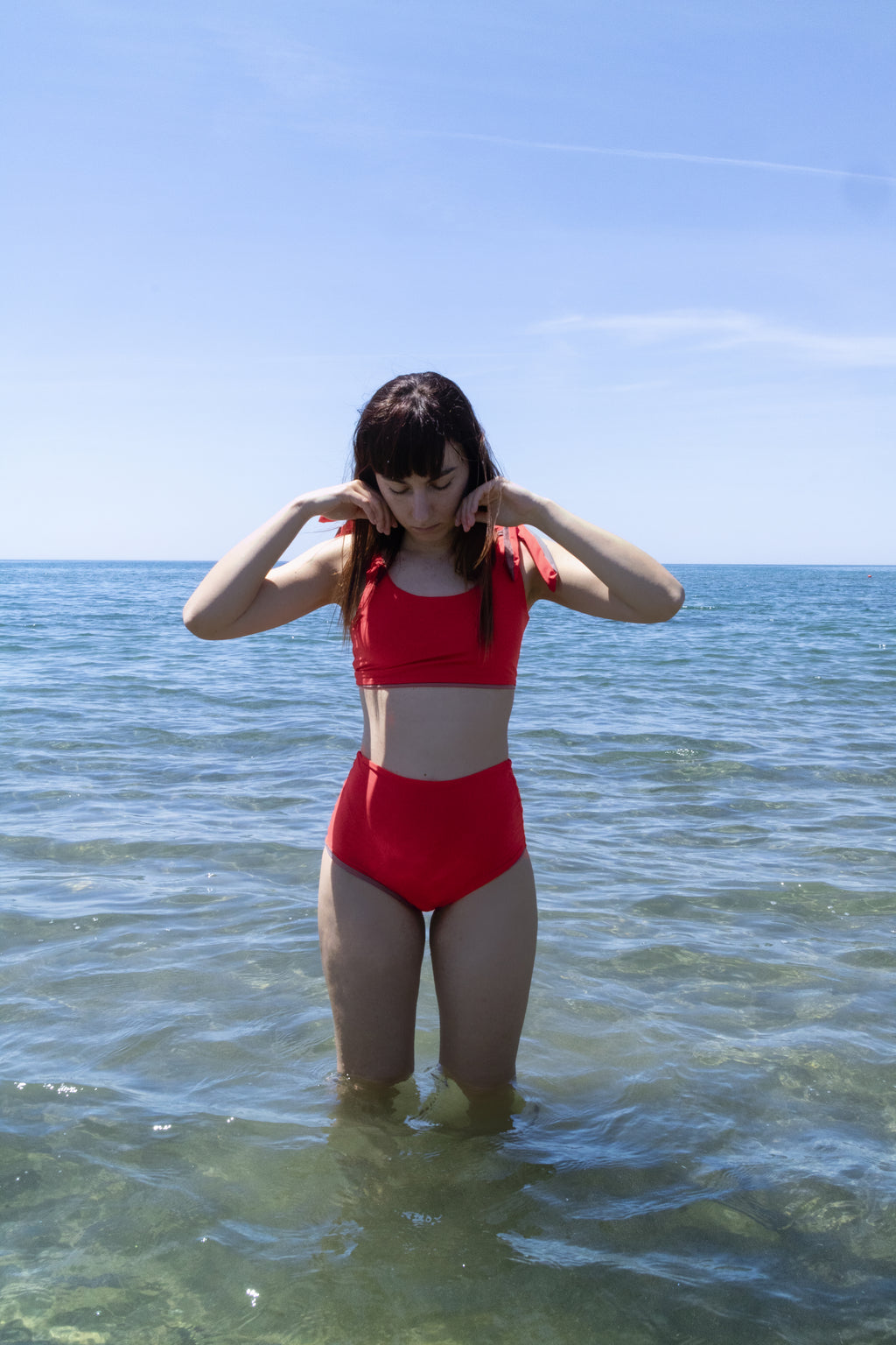 Bikini top double face rosso arancio e fango